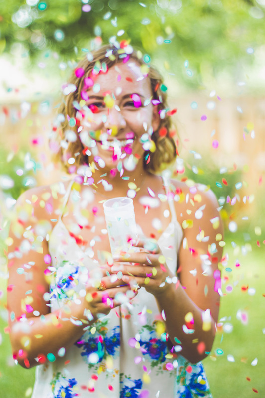 Senior picture with confetti taken by Riley Howk Photo